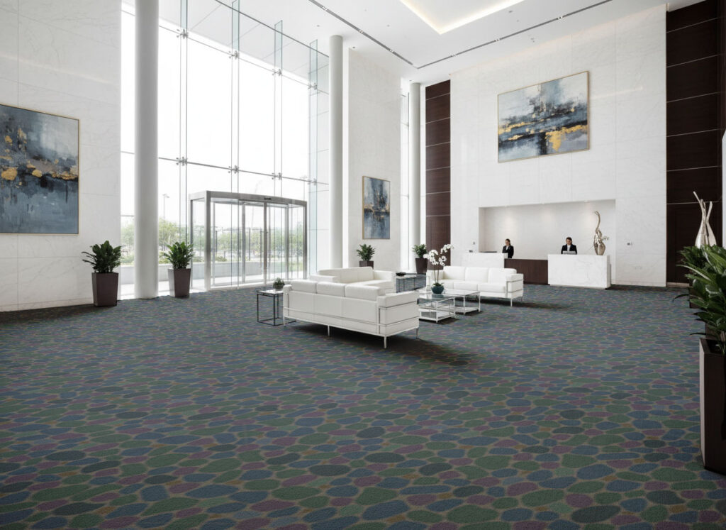 An AI rendering of of large lobby. The flooring overlay features random coloured stones using a vandalea tile to avoid repeating patterns and create a randomized look.
